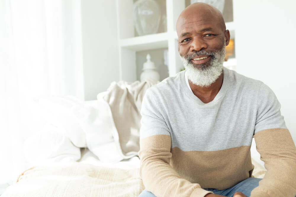 Mature man with beard looking at camera