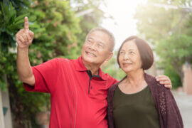 Older Couple Walking Outside