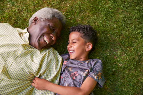 Senior and child smiling