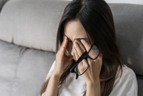 Girl suffering from dry eye